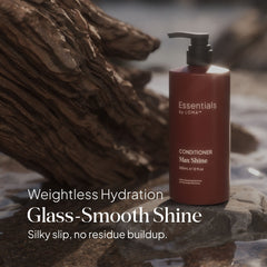 Essentials by LOMA Max Shine Conditioner 12 oz pump bottle displayed on rocks with weightless hydration, glass-smooth shine, and silky slip messaging