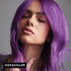 Model with long, straight vivid purple hair demonstrating the result of Keracolor Color + Clenditioner Purple