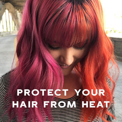 Pink and orange color-treated hair protected from heat with Keracolor Keep It Tame Blowout Cream