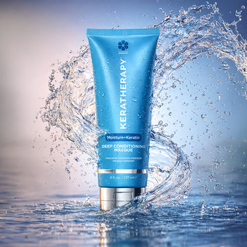 Keratherapy Moisture+Keratin Deep Conditioning Masque 8 oz tube surrounded by splashing water