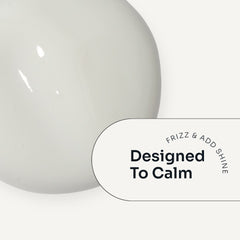 Loma Calming Crème cream texture with a calming anti-frizz and shine benefit