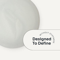 Loma Curvy Crème styling cream texture with text highlighting curl definition without stiffness