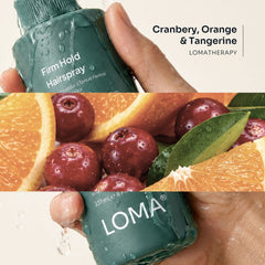 Wet Loma Firm Hold Hairspray bottle with cranberry, orange, and tangerine aromatherapy imagery