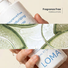 Wet Loma Fragrance Free Moisturizing Shampoo bottle held beside aloe and citrus imagery, featuring a fragrance-free formulation