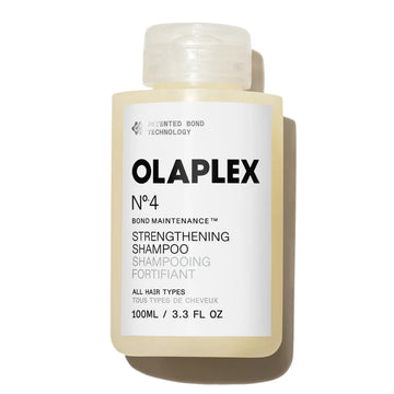 OLAPLEX Nº.4 Bond Maintenance Strengthening Shampoo 3.3 oz bottle for all hair types on a white background