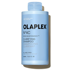 OLAPLEX Nº.4C Bond Maintenance Clarifying Shampoo 8.5 oz bottle for all hair types on a white background
