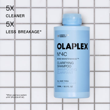 OLAPLEX Nº.4C Clarifying Shampoo 8.5 oz bottle with a claim of 5x cleaner hair and 5x less breakage when used with Nº.3PLUS