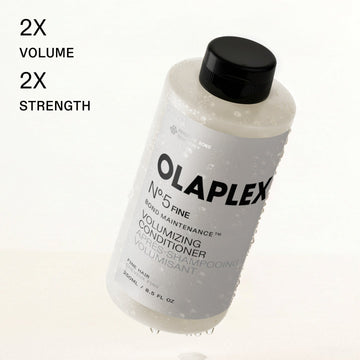 OLAPLEX Nº.5FINE Volumizing Conditioner bottle with text highlighting 2x volume and 2x strength for fine hair