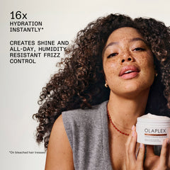 OLAPLEX Rich Hydration Mask graphic showing a model with curly hair and claims of 16x instant hydration, shine, and all-day humidity-resistant frizz control