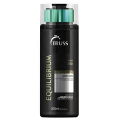 Truss Equilibrium Shampoo for oily scalp and dry lengths in a 300 ml black bottle.