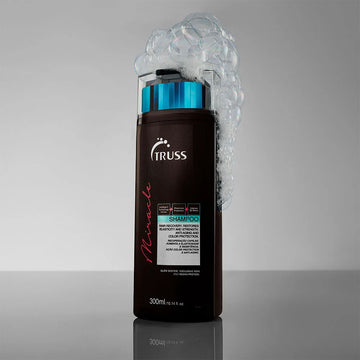 TRUSS Professional Miracle Shampoo 300 ml bottle covered with white cleansing foam