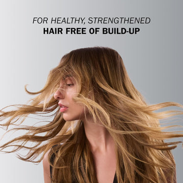 Model with long flowing highlighted hair demonstrating a healthy, strengthened and buildup-free hair result.