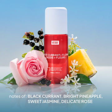 Verb Black Currant and Floral Hair and Body Fragrance Mist 5 oz surrounded by black currant, pineapple, jasmine, and rose