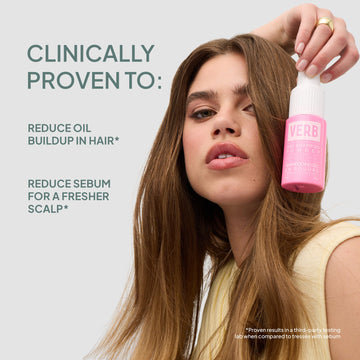 Model holding Verb Dry Shampoo Powder 2 oz with claims of reducing oil buildup and sebum for a fresher scalp